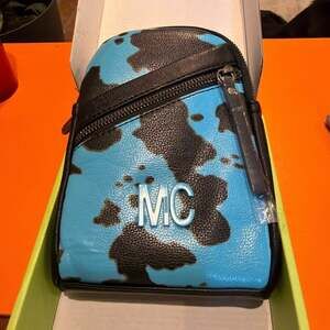 Milan Chiva Turquoise Cow Print Mini Sling Crossbody Bag